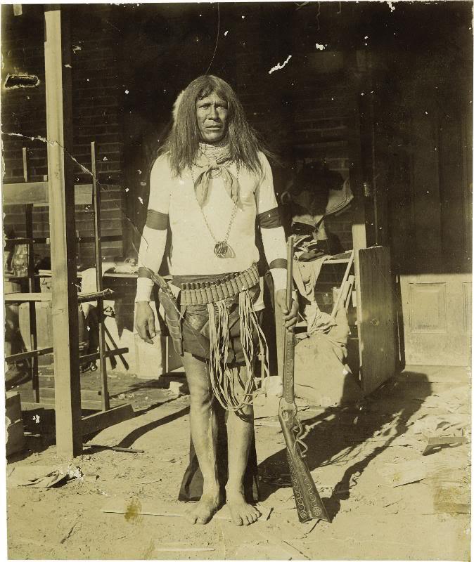 Apache warrior with Evans rifle, from 1880